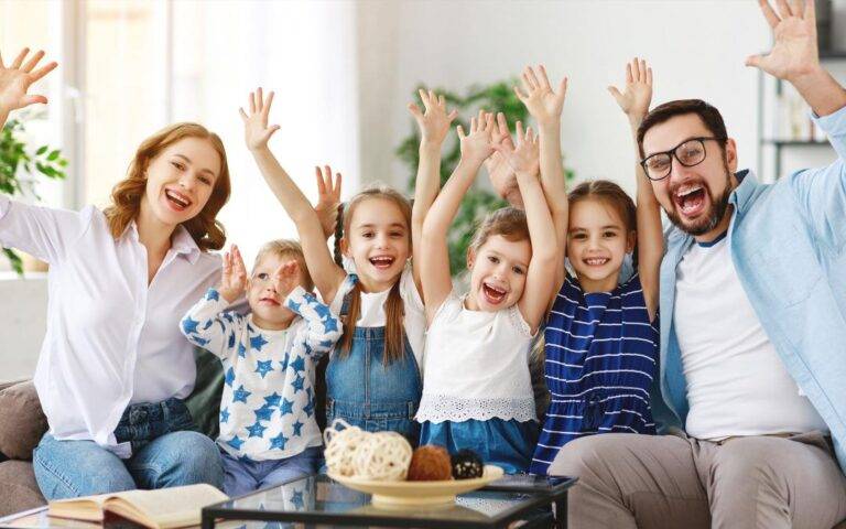 Happy family with young children celebrating together—symbolizing the peace of mind that comes from estate planning with legal document preparation services near me and trusted legal assistance near me in Santa Clara County.