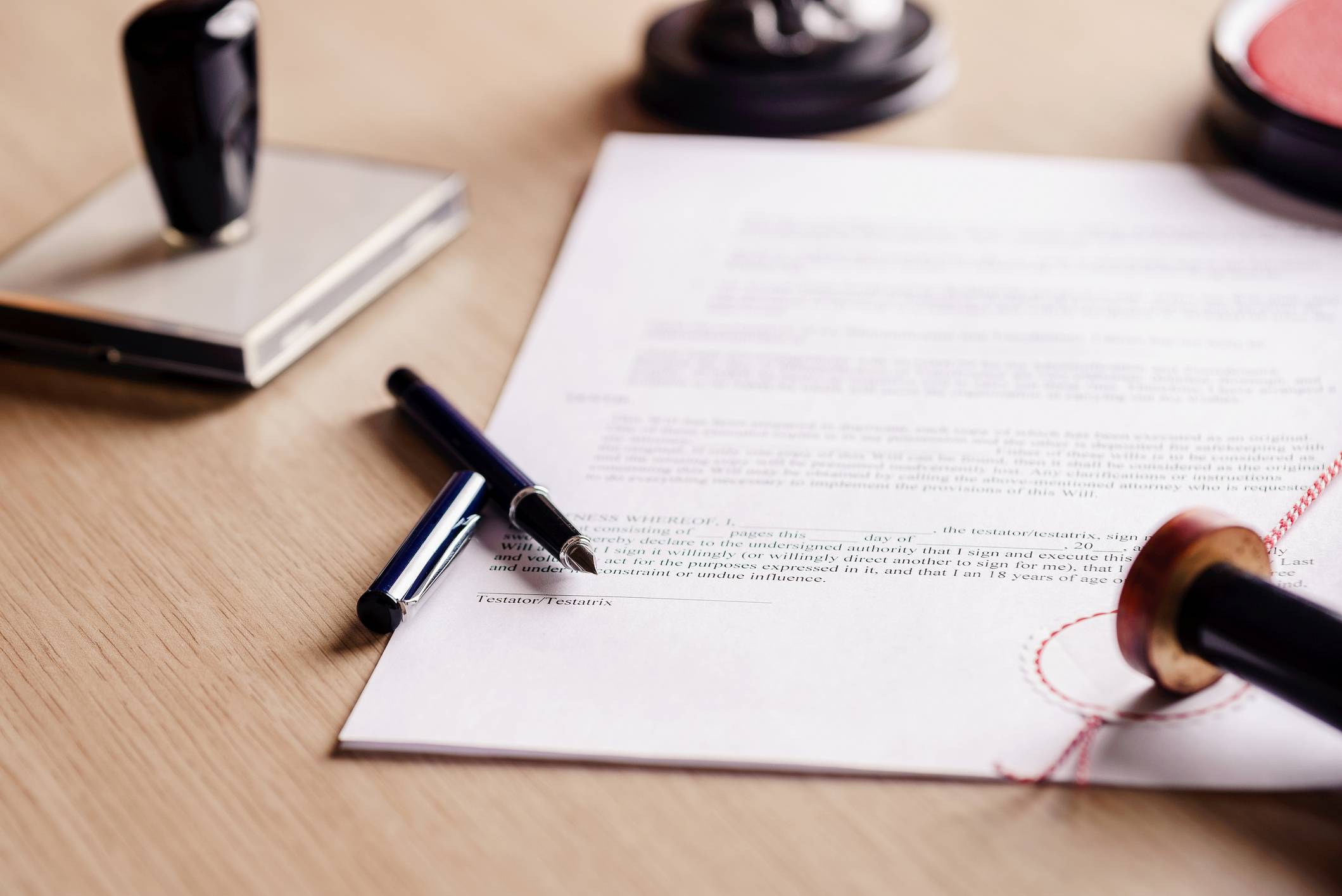 Official legal document with a pen, seal, and stamp symbolizing notary and apostille certification