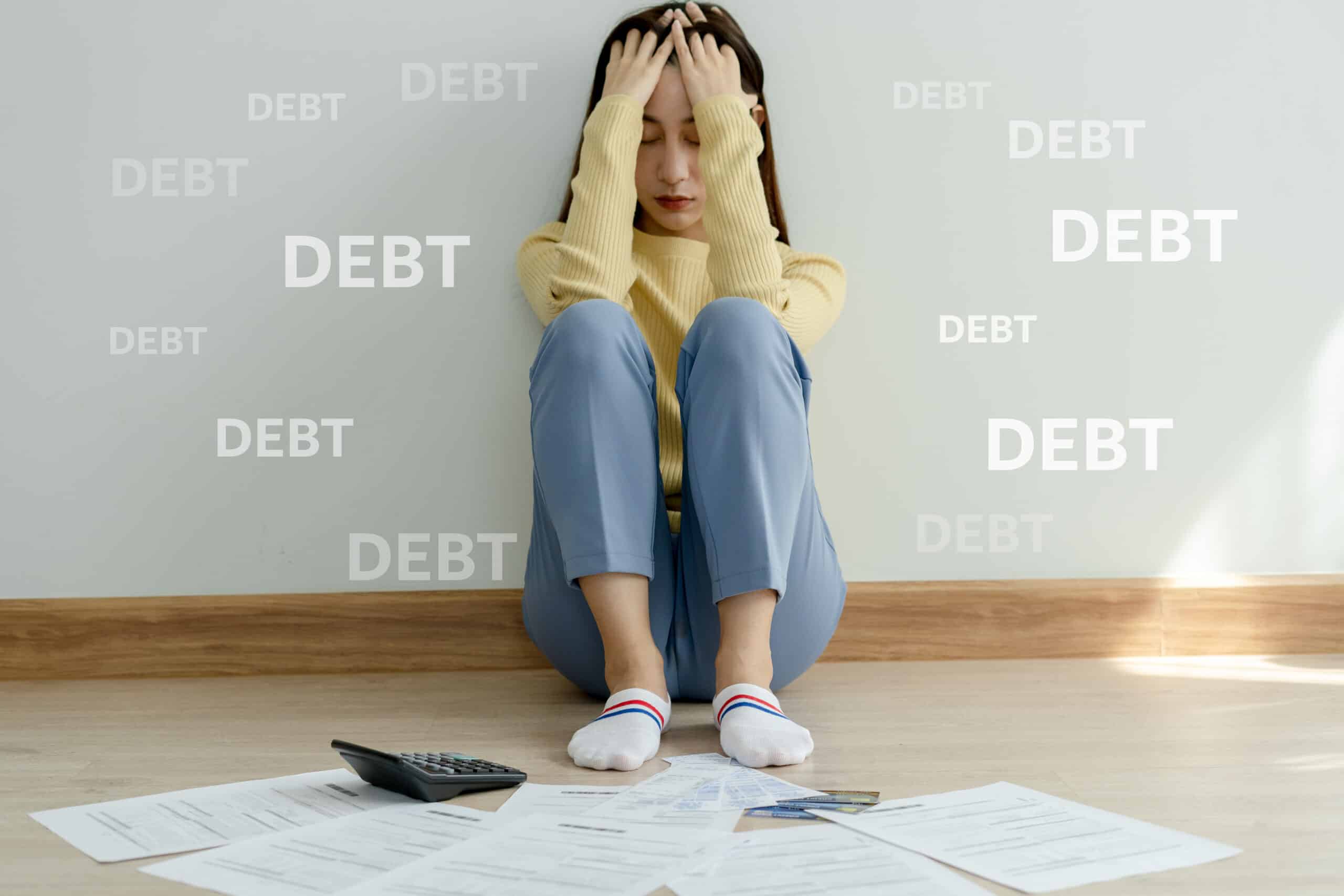 Woman stressed because of debts considering bankruptcy